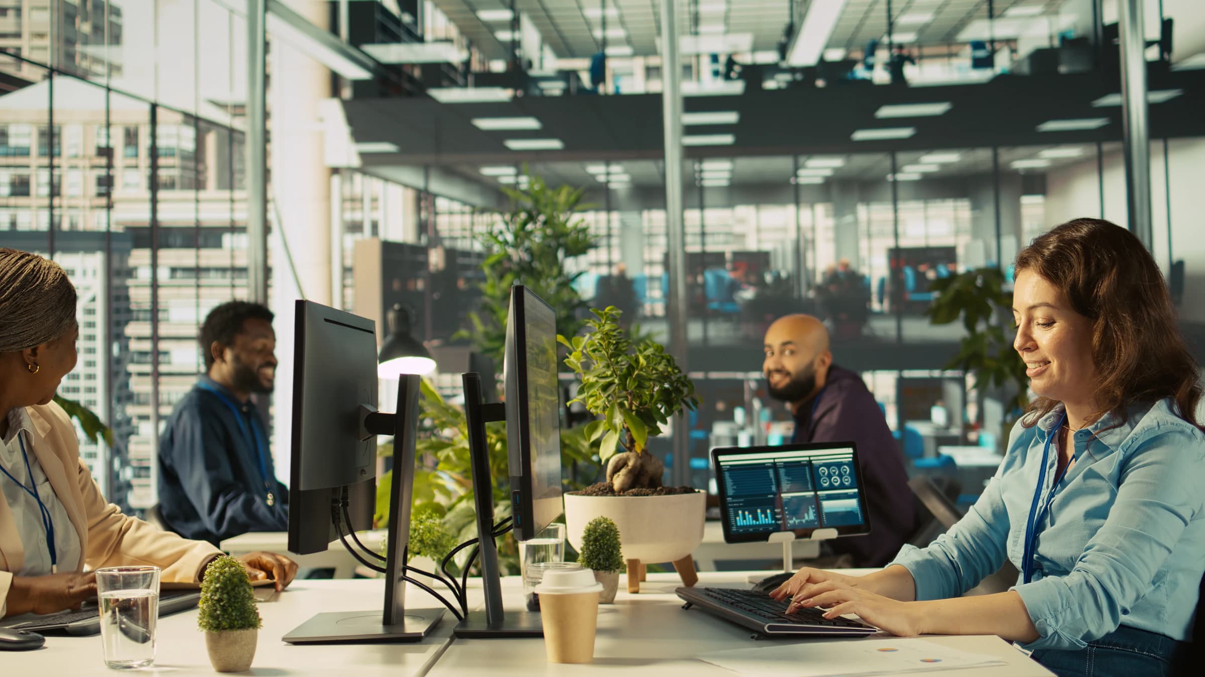 Enterprise team collaborating in modern office workspace